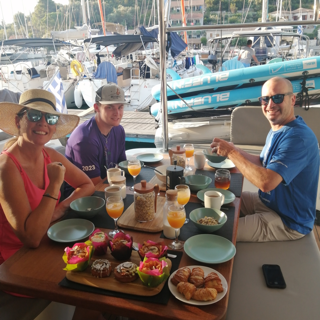Catamaran JOY anchored near Kalamos.
