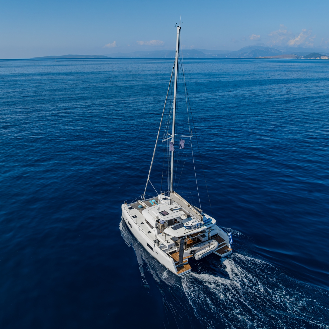 Cruising between the islandson Catamaran JOY.